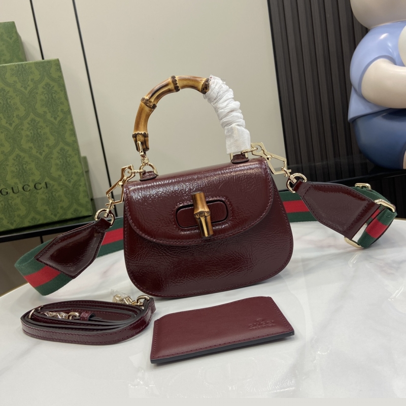 G*u*i top handle bags